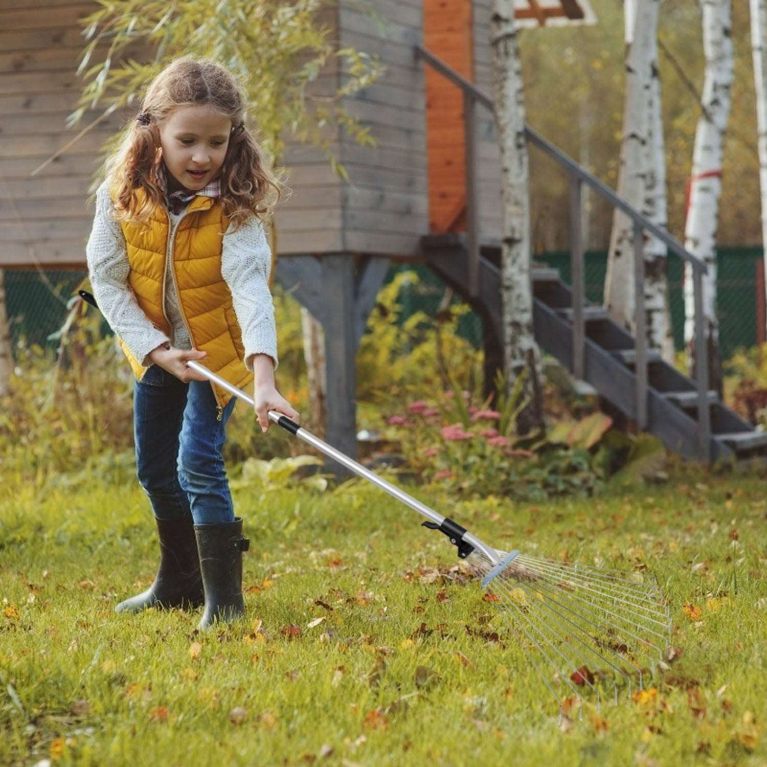 Girl Cleaning with the Expandable Leaf Rake